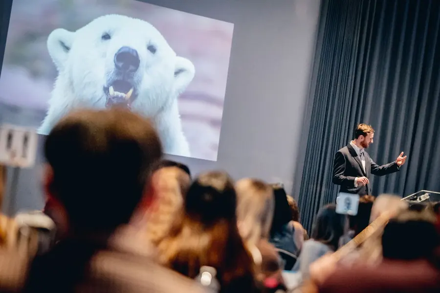 Mark Agnew speaking to a corporate audience at a keynote event